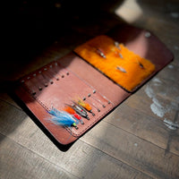Portefeuille à longues mouches tube