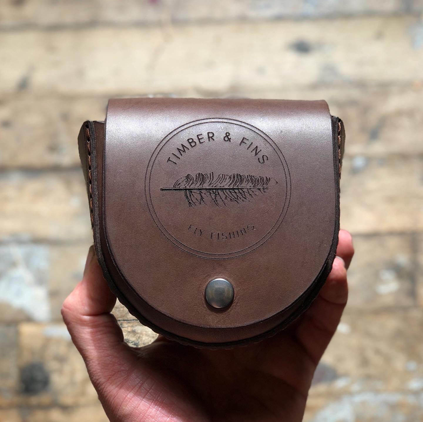 Handcrafted leather reel case. We can make them to fit any of your reels,  just reach out or visit our Custom Reel Case page! • Heirloom